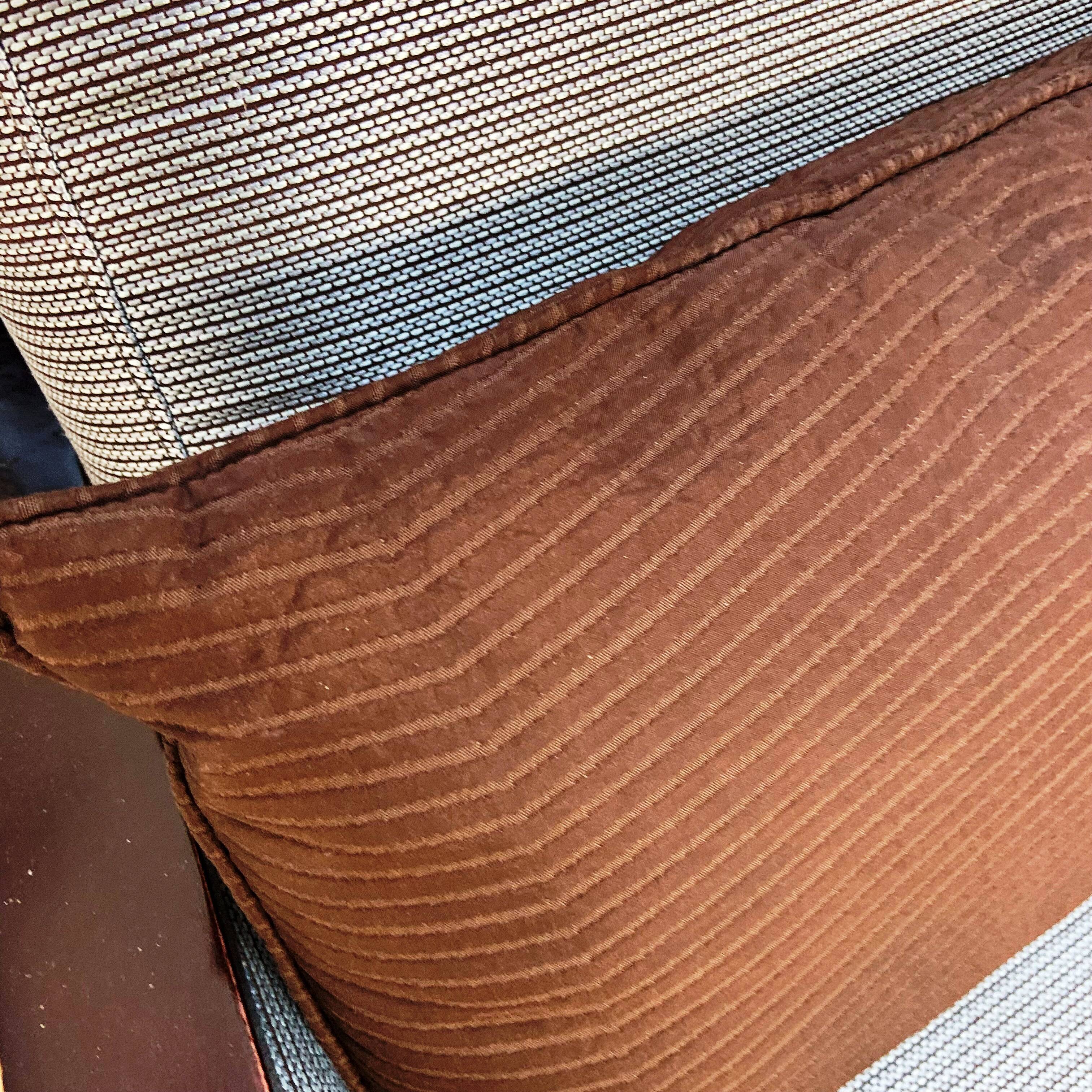 Pair of designer armchairs