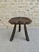 Tabouret tripode en bois massif, avec assise sculptée