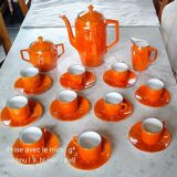 Iridescent orange porcelain coffee set from the 50s-60s with black edging