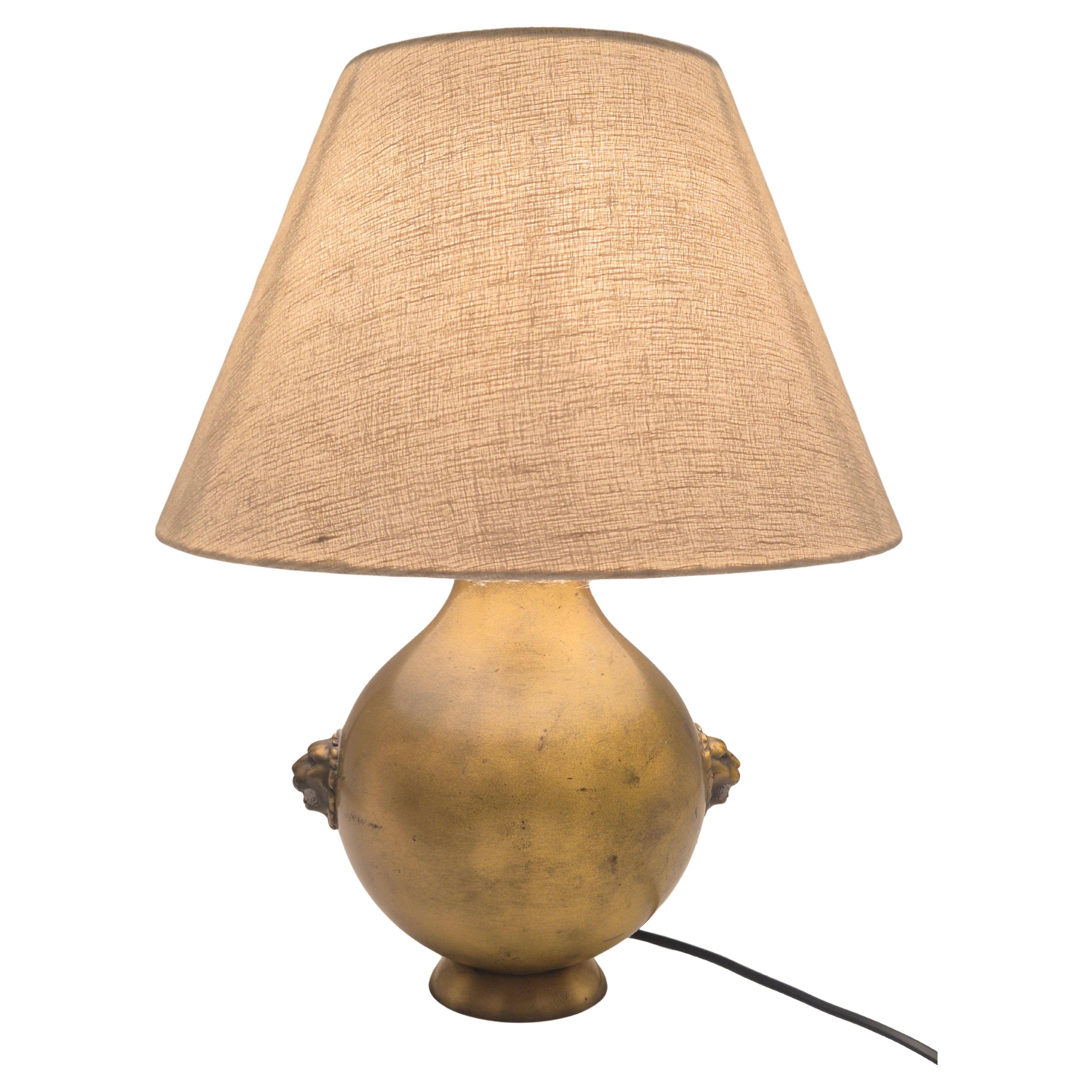 Table lamp in brass with lion decor, Swedish Grace 1920/30s