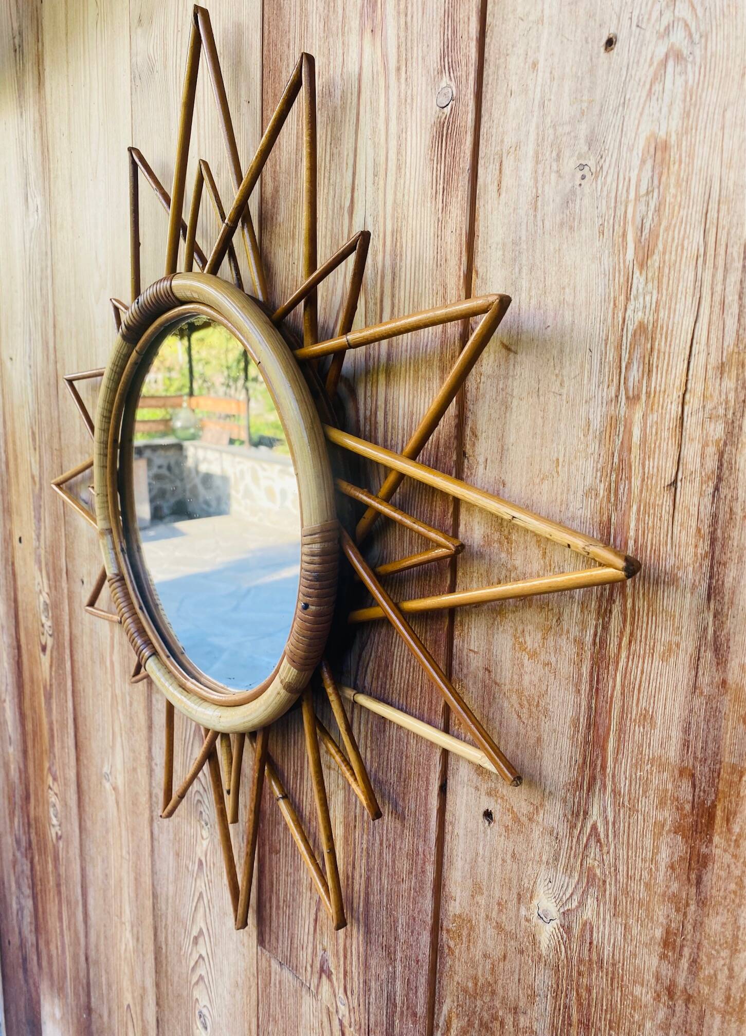 Vintage 60s/70s rattan sun mirror.