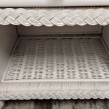 White rattan chest of drawers and bedside table
