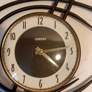 Horloge murale bayard  ortf en métal noir et laiton doré. 1960