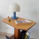 Vintage folk art magazine rack side table