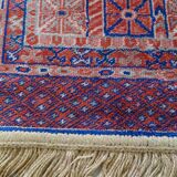 Tapis d’Orient bleu rouge avec franges