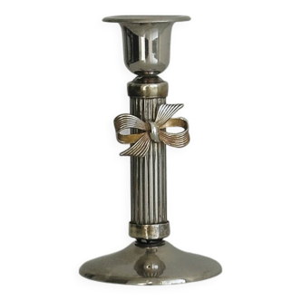 Patinated metal candle holder with knot