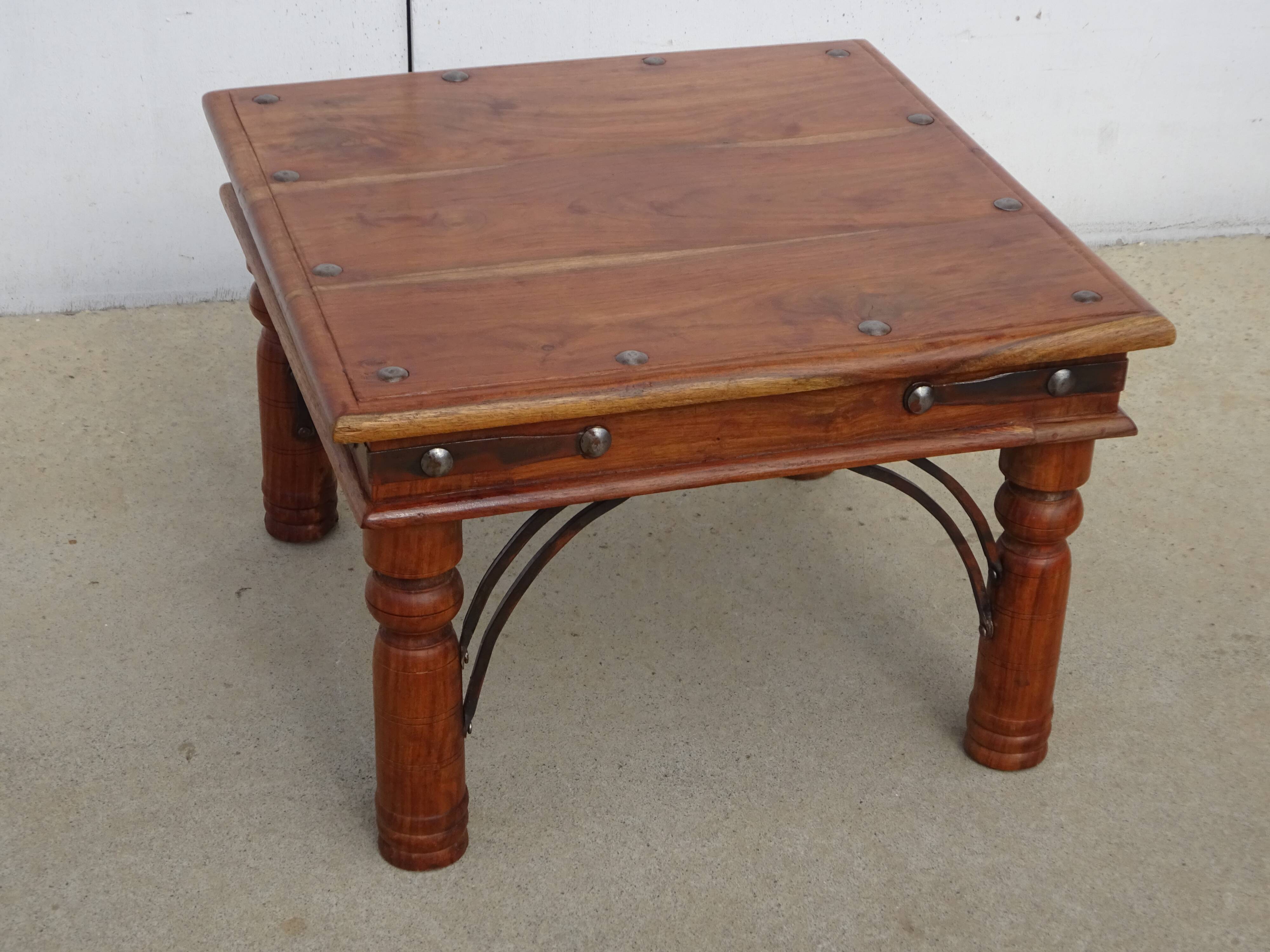 Square coffee table in exotic wood and wrought iron.