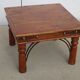 Square coffee table in exotic wood and wrought iron.