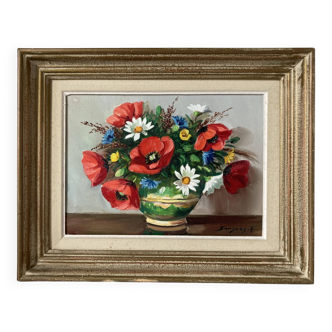 Tableau peint à l’huile sur toile représentant un bouquet de fleurs signé Surgeon.