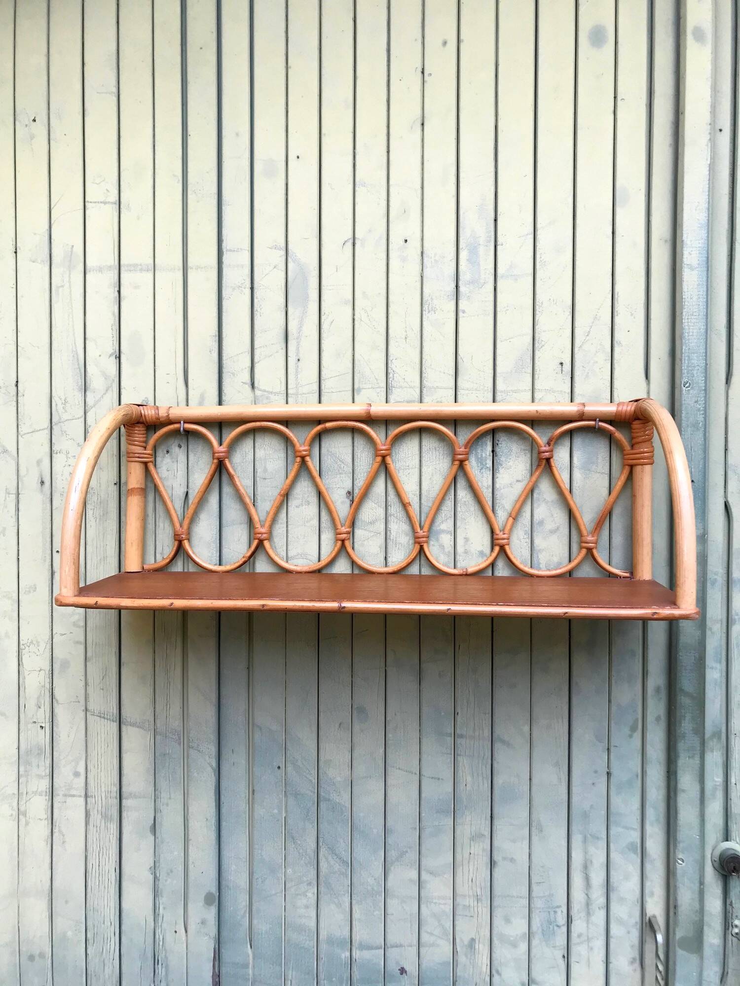 Vintage rattan shelf from the 60s