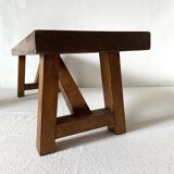Low stool in varnished wood