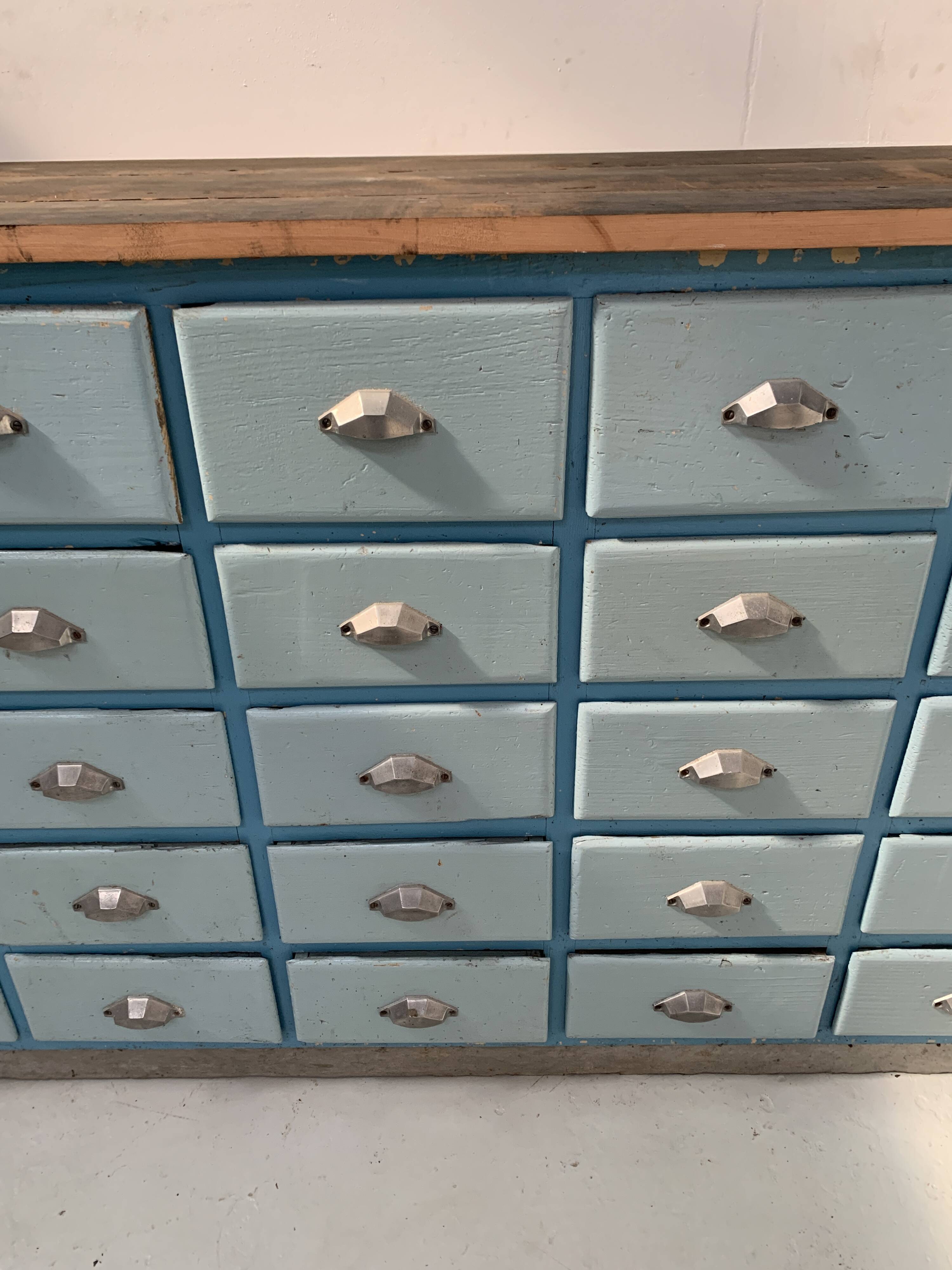 30-drawer storage unit in patinated fir, 20th century