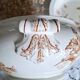 Antique iron earthenware plates accompanied by dishes