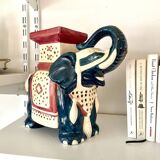 Blue and red ceramic elephant plant stand