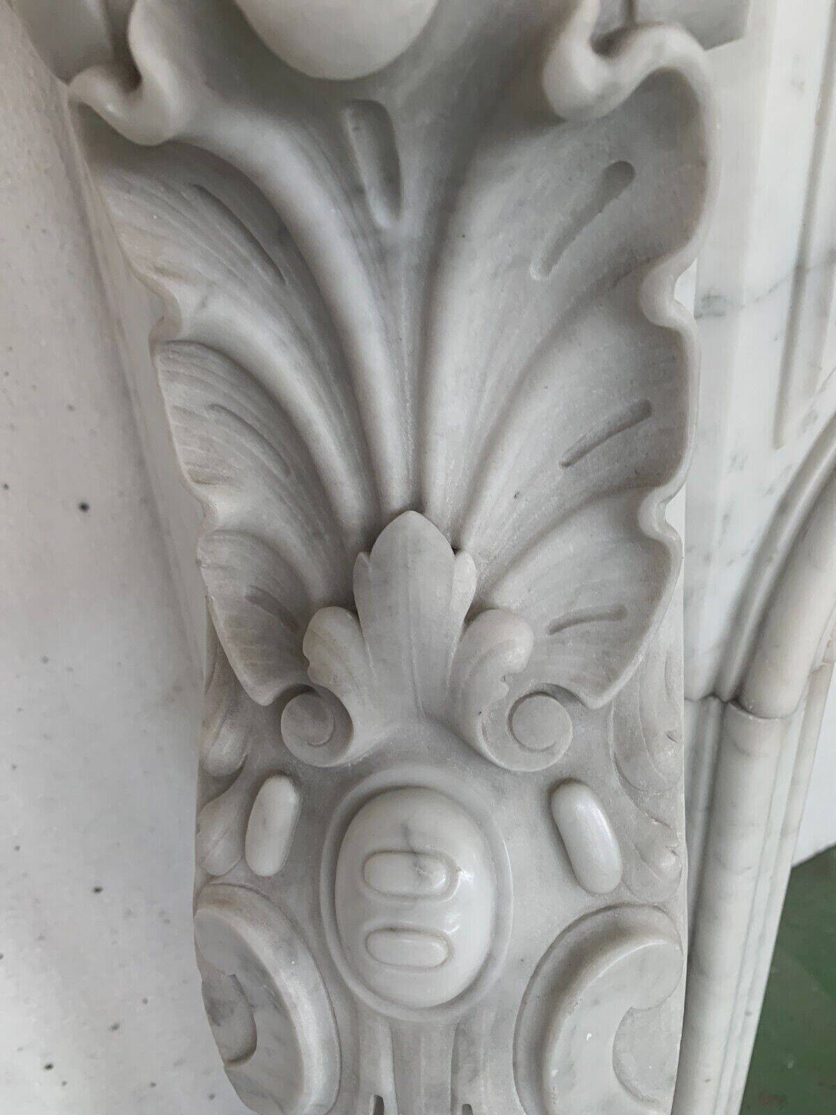 Louis XV style fireplace in white Carrara marble 19th century