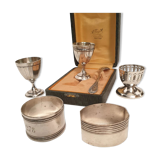 3 shells and 2 silver metal napkin rings