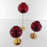 Set of three Hans-Agne Jakobsson AB Markaryd NR135 red tealight holders