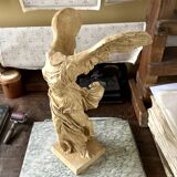 "Winged Victory of Samothrace", beige plaster statuette