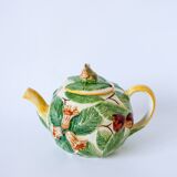 Tea service consisting of a teapot, a milk jug and a numbered hazelnut slip sugar bowl