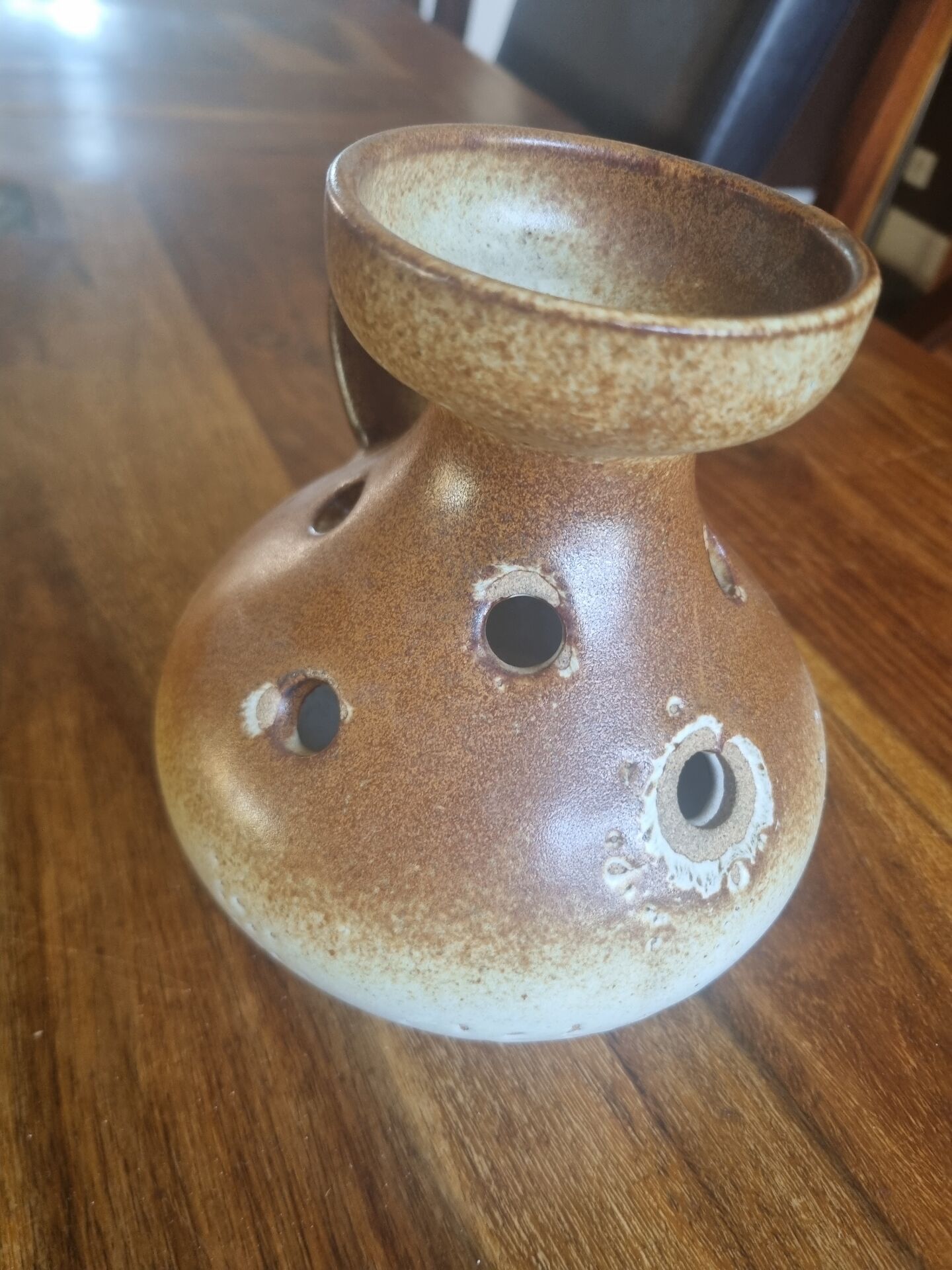 Stoneware vase with flower spikes