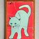 Wooden frame puzzle from the 1960s depicting a cat.