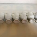 Six white hen egg cups