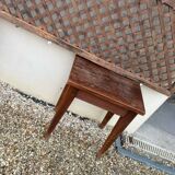 Headboard and its two wooden bedside tables.