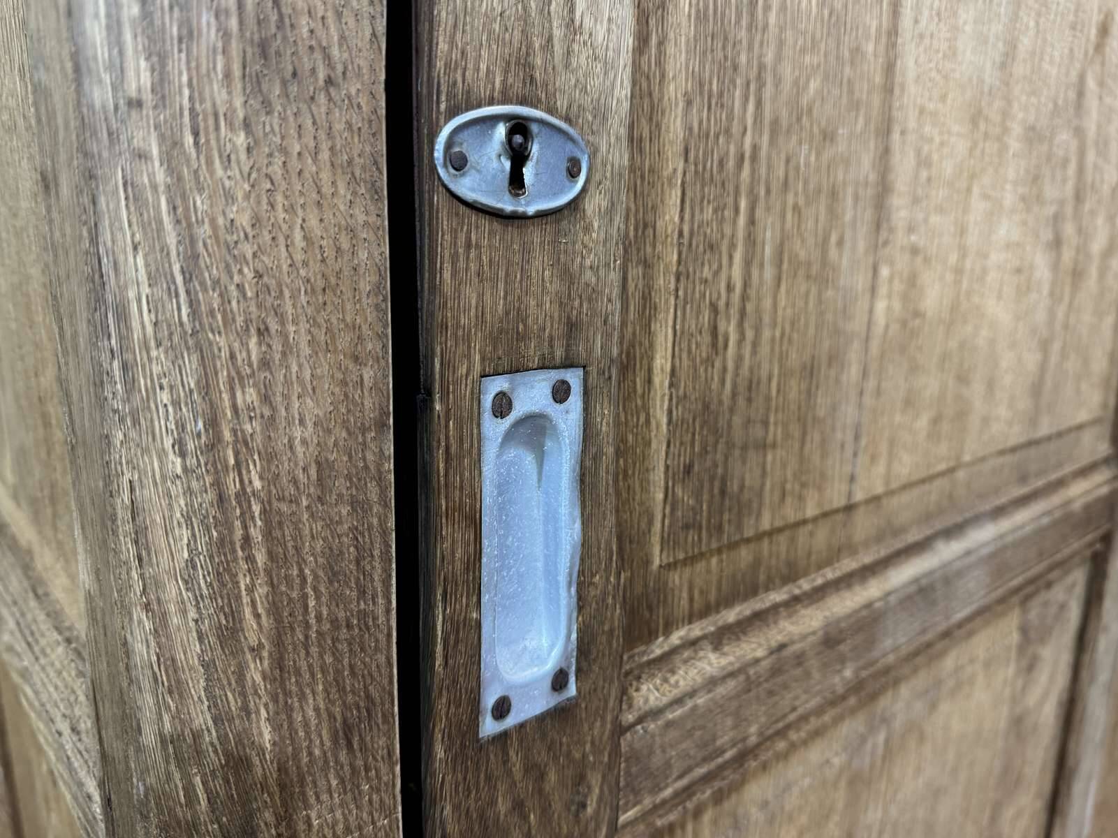 Oak wardrobe with sliding doors from the 1930s.
