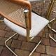 Octagonal brass and glass dining table with 4 chairs, 1960s