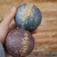 Four bowling balls