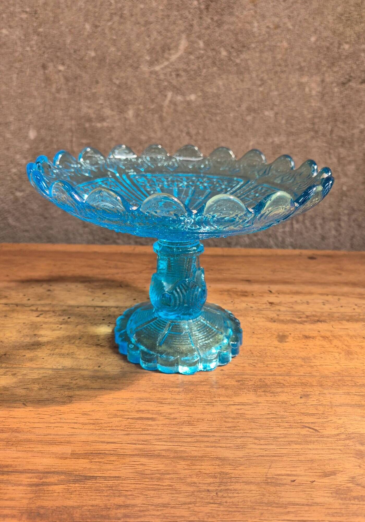 Blue glass footed fruit bowl.