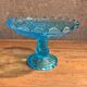 Blue glass footed fruit bowl.