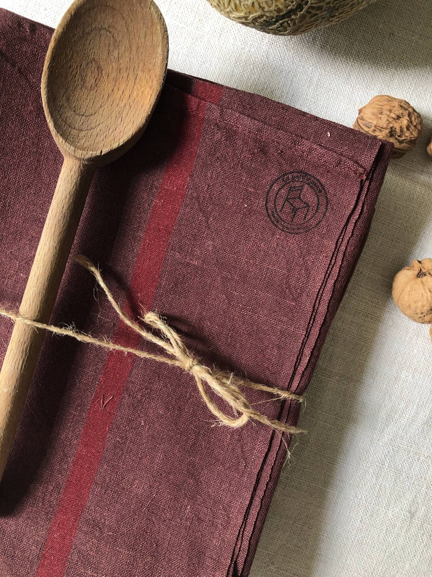 Set of two old tea towels in pure linen tinted in burgundy