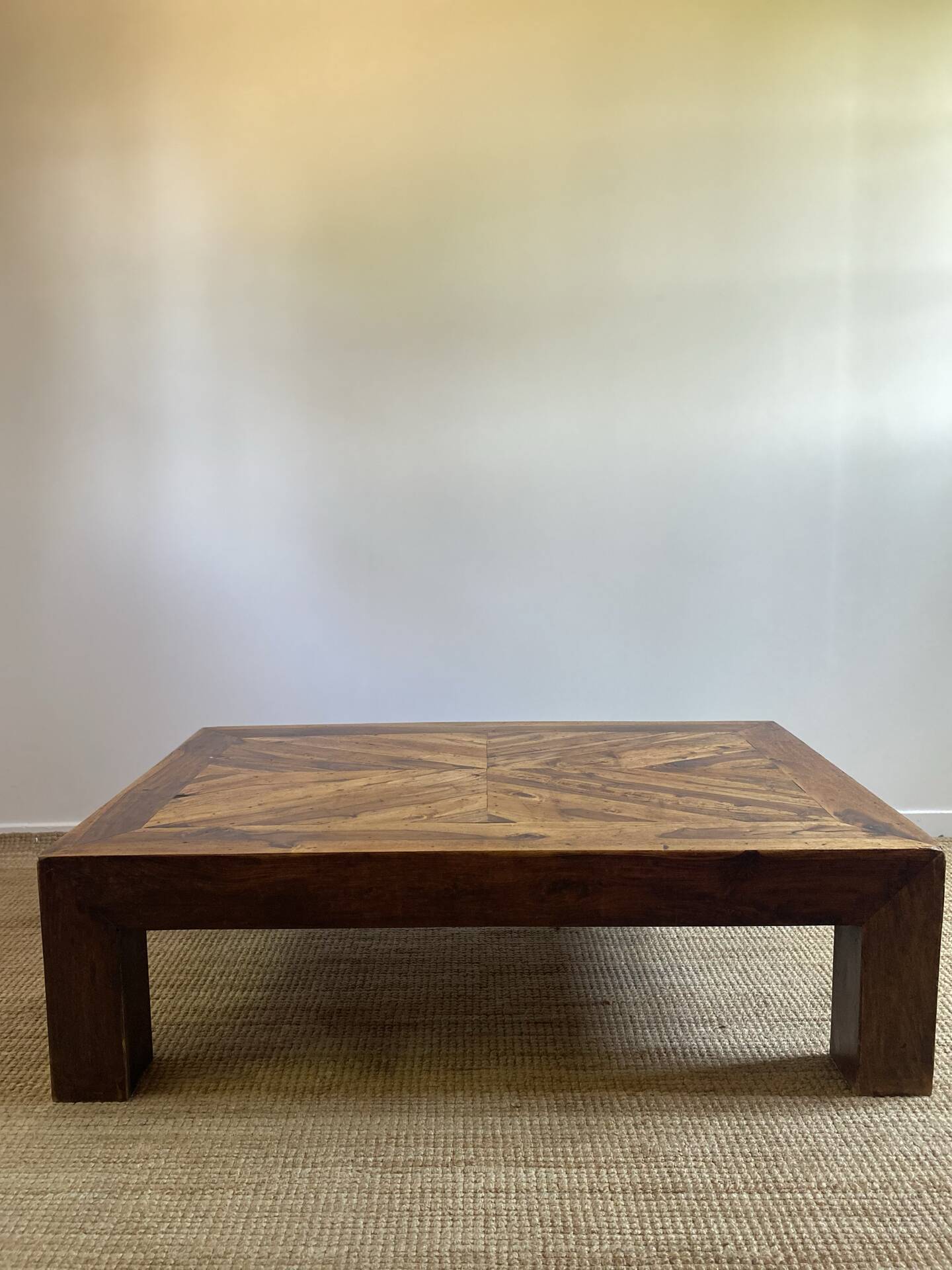 Solid wood coffee table with marquetry top