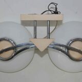 Pair of 60s wall lights in metal and opaline