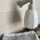 Art Deco wall light in ceramic and opaline.