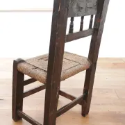 17th-century farmhouse chair with carved motifs – wabi sabi