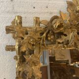 Miroir de style Louis XVI en bois sculpté et doré a la feuille d'or XIX siècle