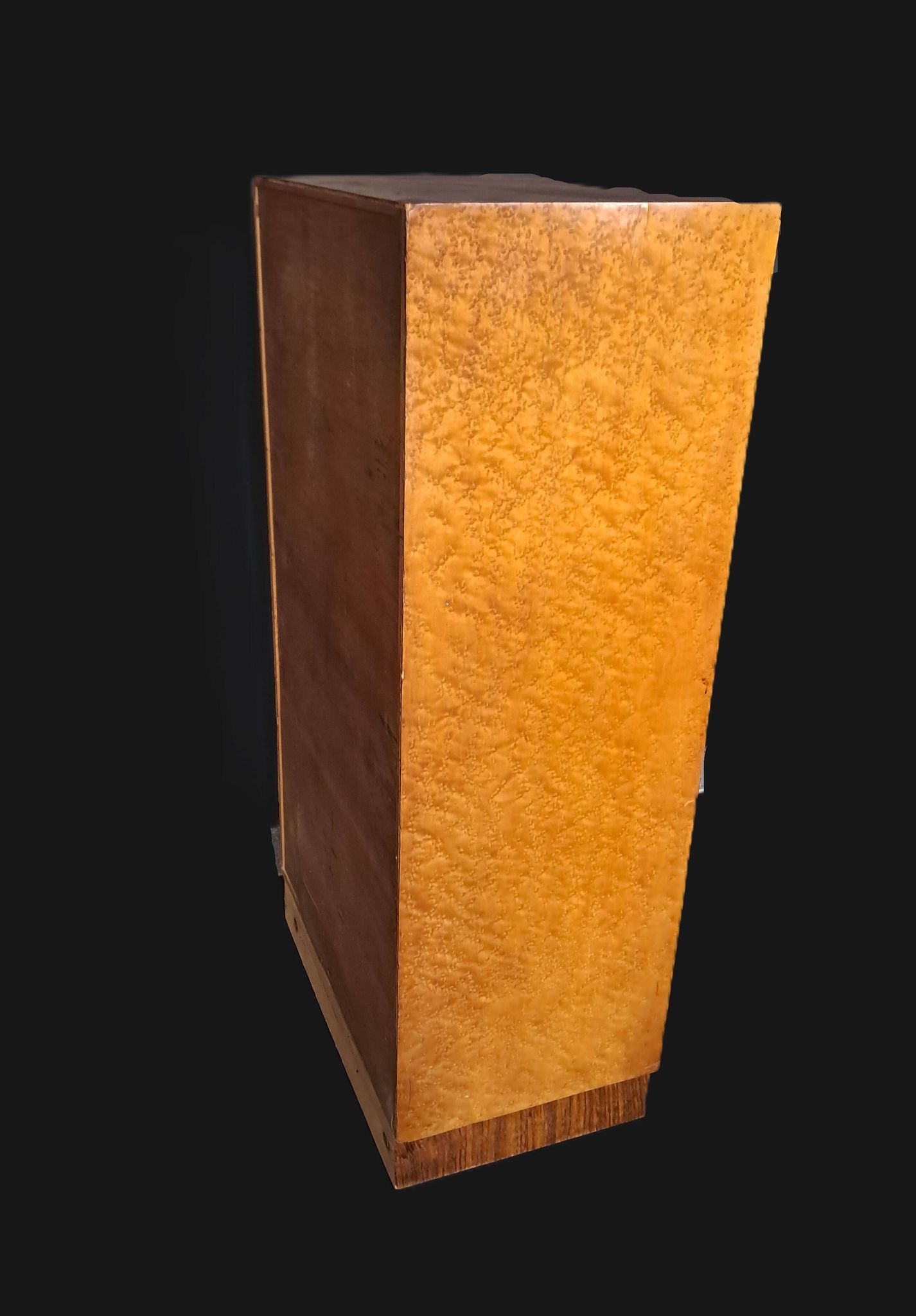 Art Deco cabinet in speckled maple veneer with asymmetrical shelves.