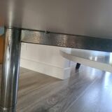 Coffee table from the 60s in smoked glass