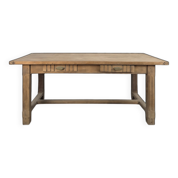 Art Deco farmhouse table in stripped oak with two drawers and fluted legs.