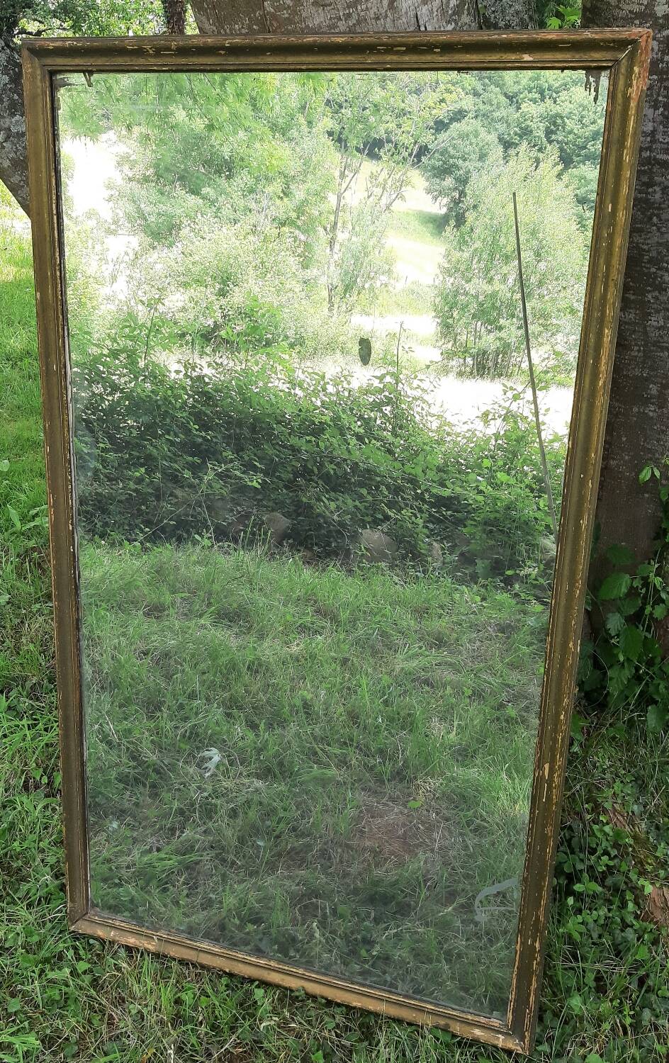 Antique mercury mirror. (Fireplace mirror)