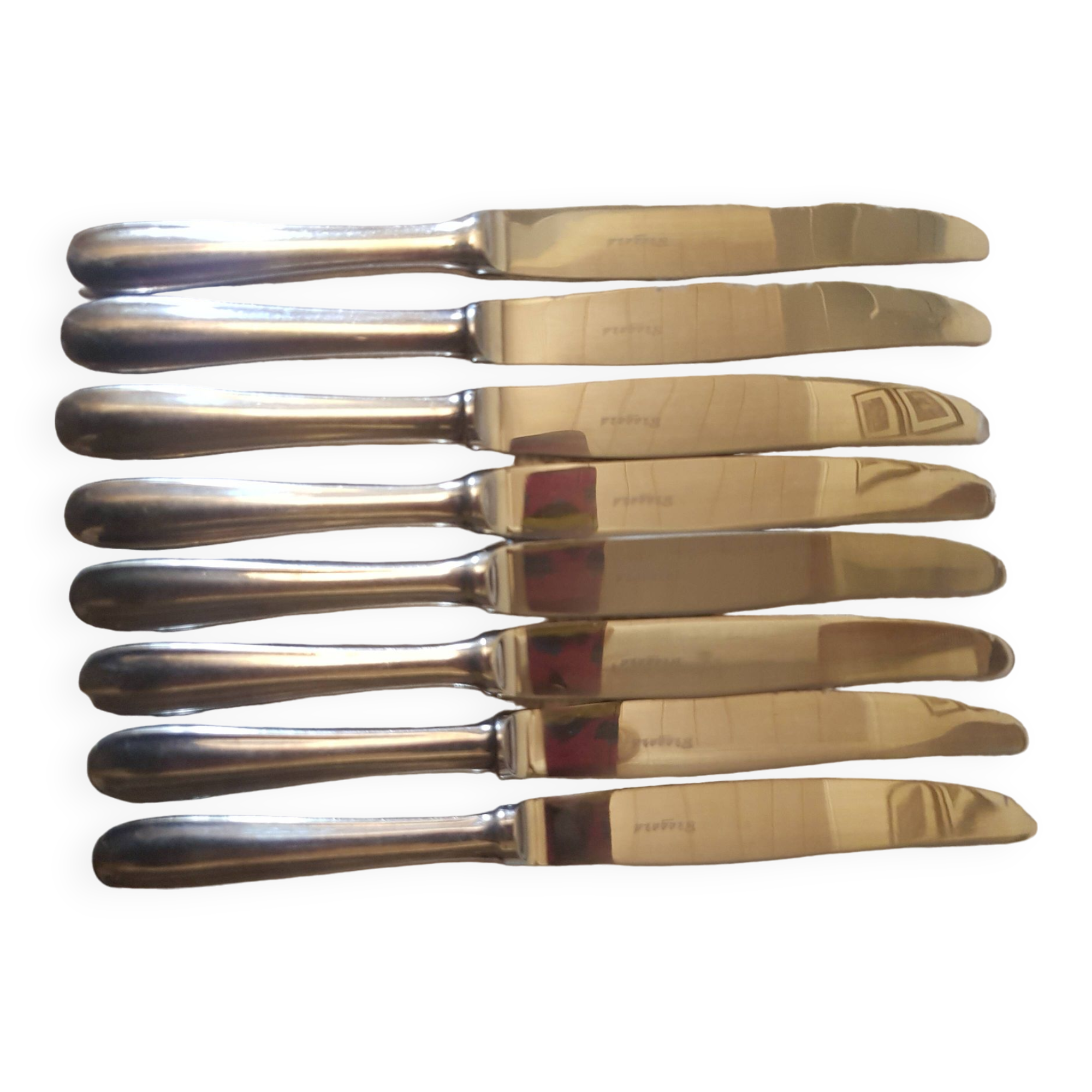 Set of 8 silver metal knives