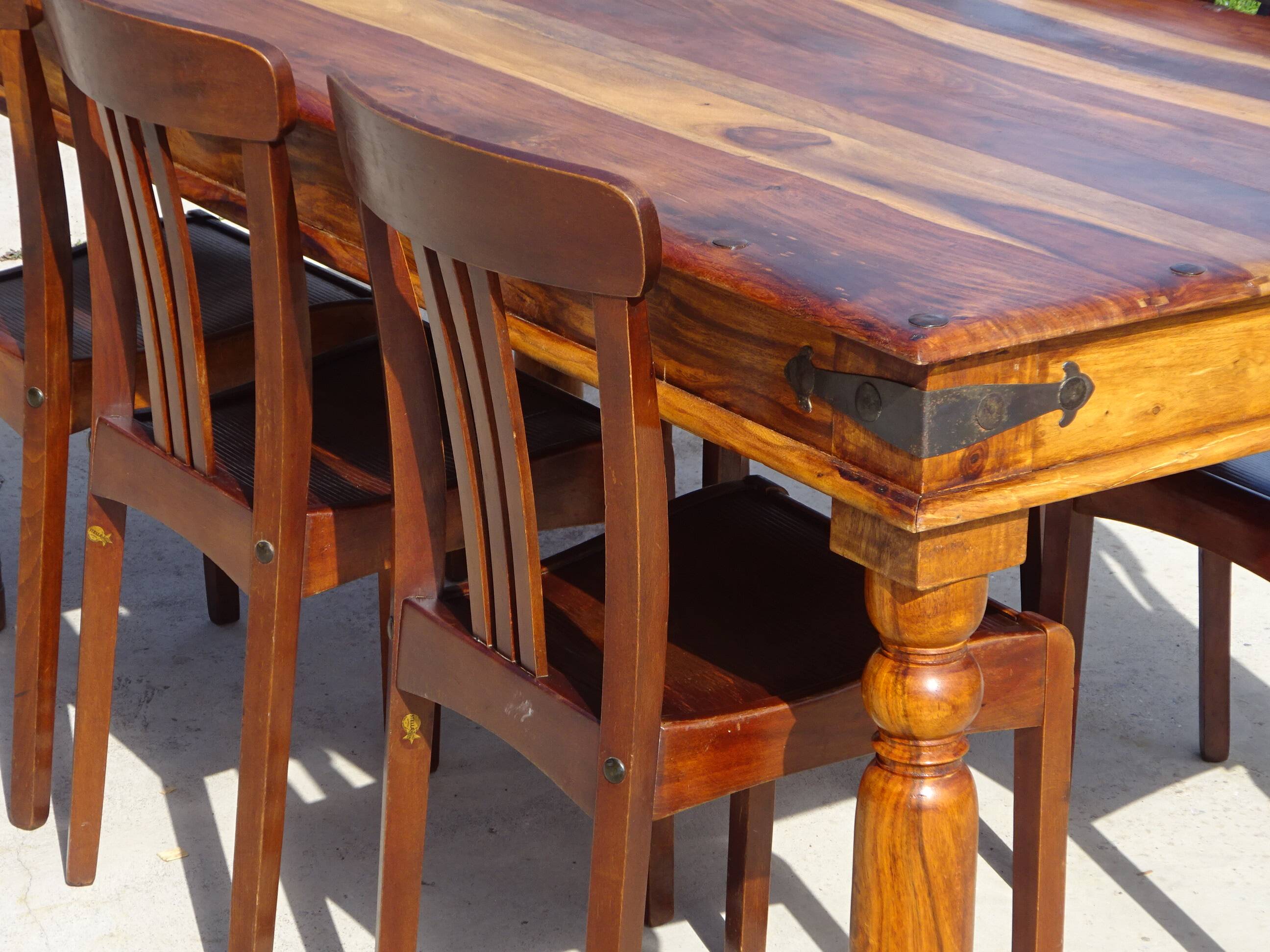 Solid wood and wrought iron table