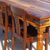 Solid wood and wrought iron table