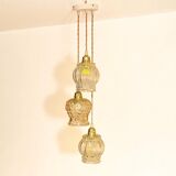 Cascade pendant light with 3 molded glass globes in vintage arabesque amber glass