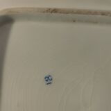 Plate with phosphatic porcelain decoration