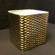 Golden ceramic cube wall light