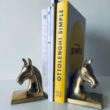 Pair of brass horse book set