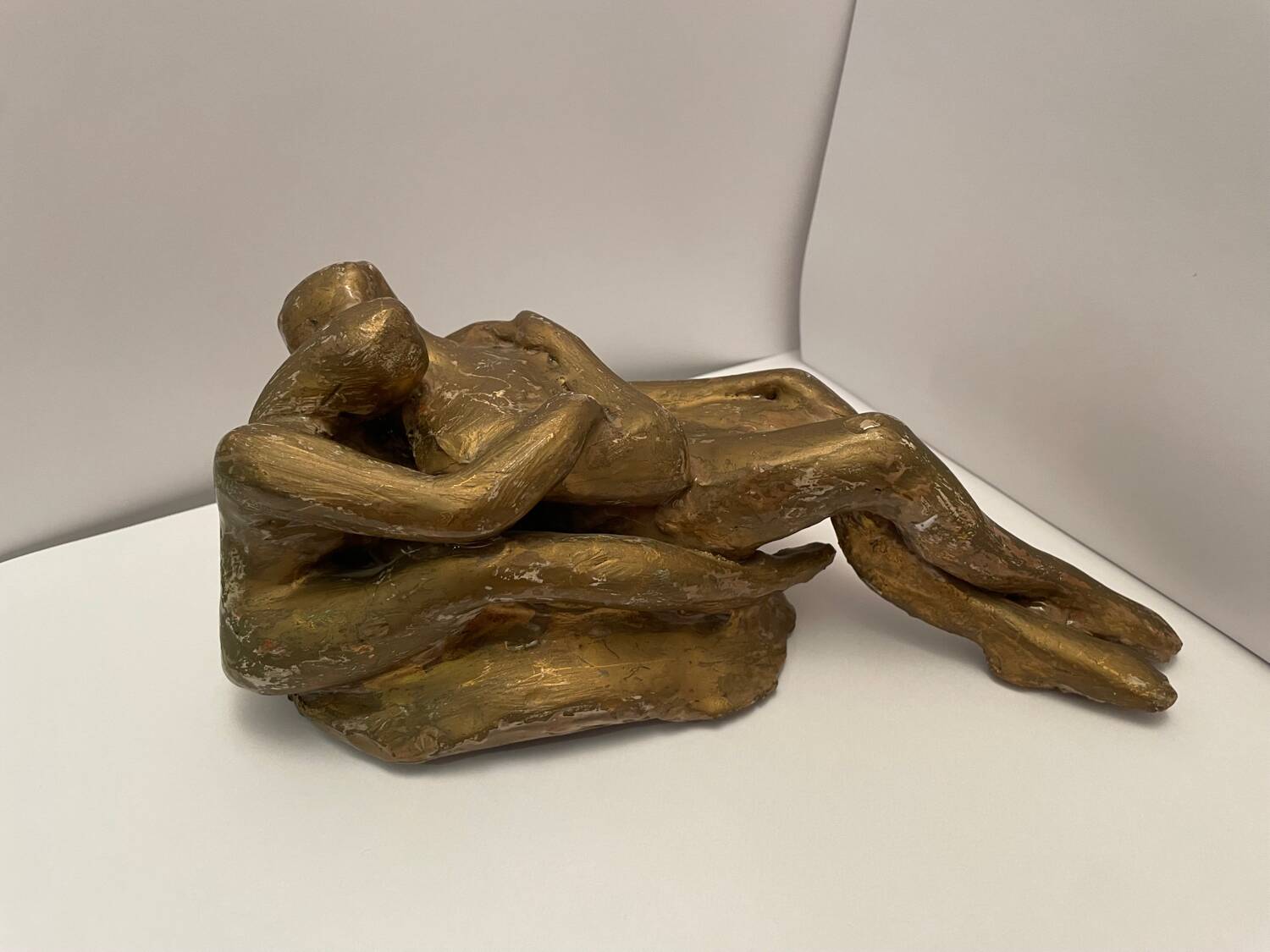Sculpture of an embracing couple 20th century signed